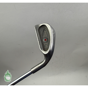 Close-up of a used Ping Eye 2 2-iron club head with red dot cavity badge and steel shaft.