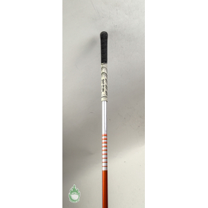 Orange graphite golf club shaft with black Golf Pride grip and white banded section near the top.