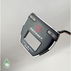 Black Odyssey Jailbird 380 mallet putter head with red logo and square center cutout shown against a light background.