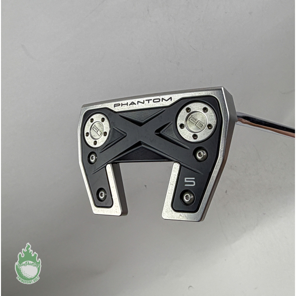 Close-up of a Scotty Cameron Phantom X 5 mallet putter head with dual weights against a light gray background.