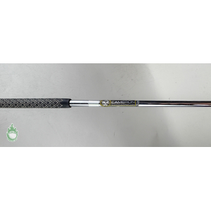 A Scotty Cameron Phantom X 5 putter shaft with black patterned grip and “33 CAMERON” label on the chrome steel.